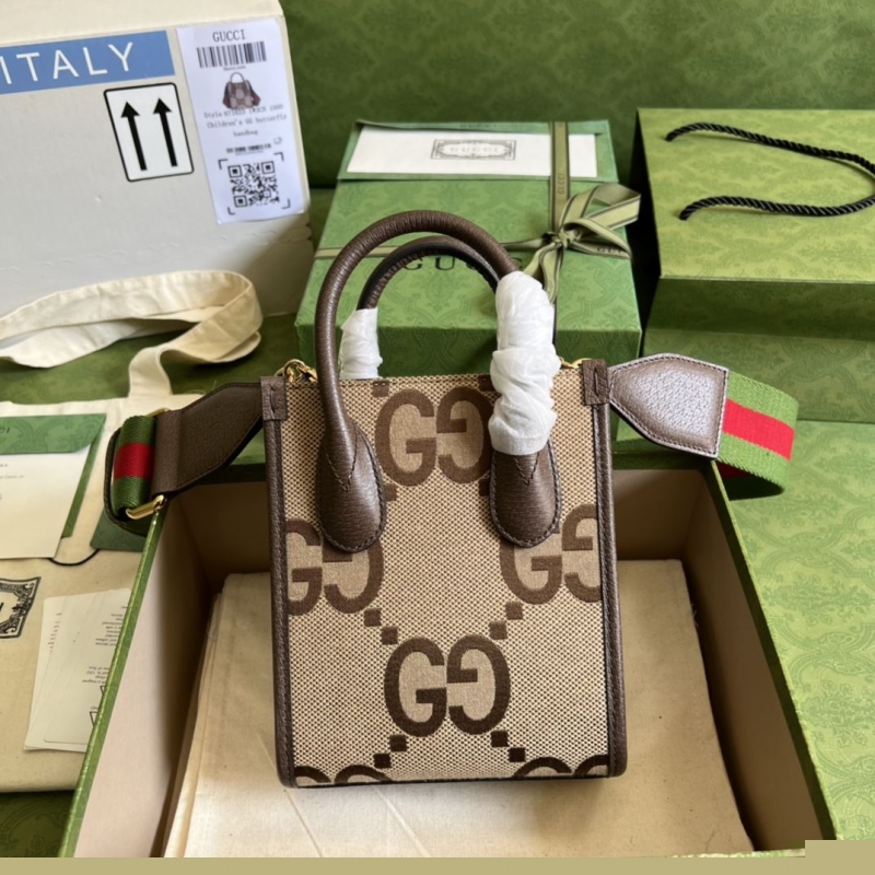 G*u*i top handle bags